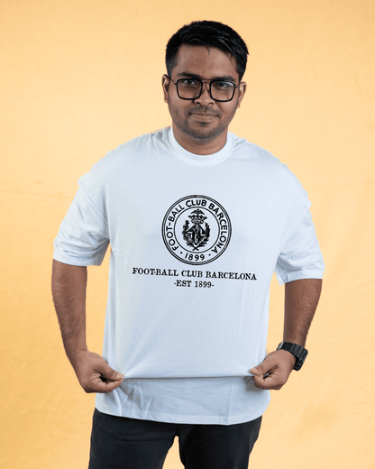 Tiki Taka Official Merchandise Printed Oversized Drop Shoulder T-Shirts for Men | Comfortable Cotton Fabric | Mad Koffee Fashion Show your passion for the game with our Tiki Taka official merchandise printed oversized drop shoulder t-shirts. Made from soft, breathable cotton fabric, these tees feature exclusive Tiki Taka designs, perfect for true football enthusiasts who love the beautiful game.