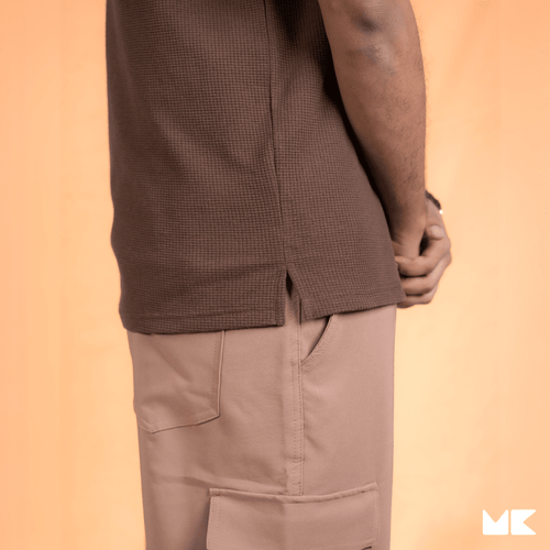 Load image 1 in gallery view. Waffle Fabric Polo T-Shirts for Men and Women | Unisex | Stylish and Comfortable | Mad Koffee Fashion Upgrade your wardrobe with our unisex waffle fabric polo t-shirts. Made from premium waffle-textured fabric, these polo tees offer a breathable fit and a sleek, versatile look, perfect for any casual or semi-formal setting.