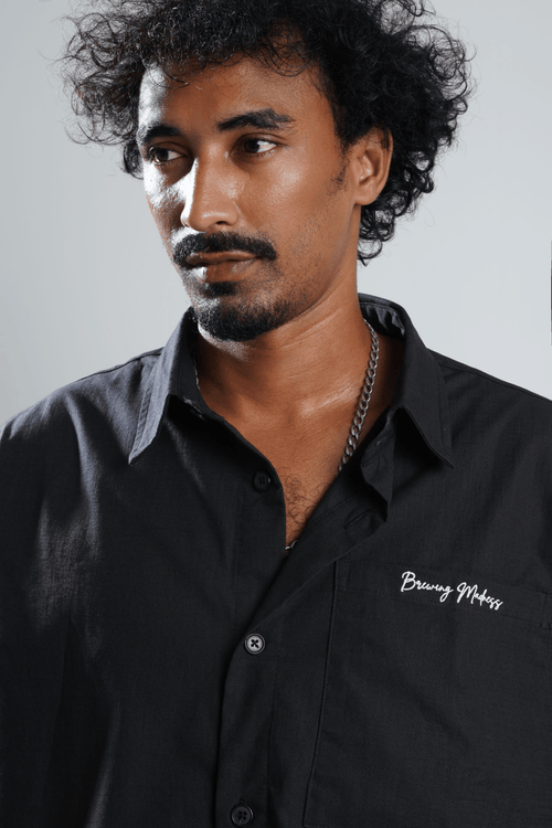 Load image 1 in gallery view. Mad Koffee Remi Cotton Boxy-Fit Shirt – Black